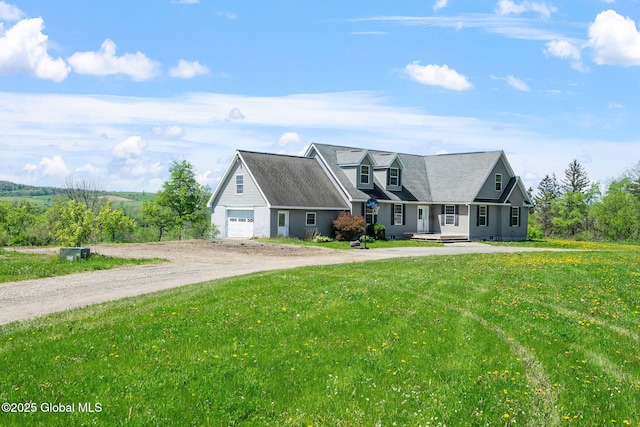 220 Anderson Cir, Fort Plain, NY 13339 - cape cod house featuring driveway, a front yard, and an attached garage