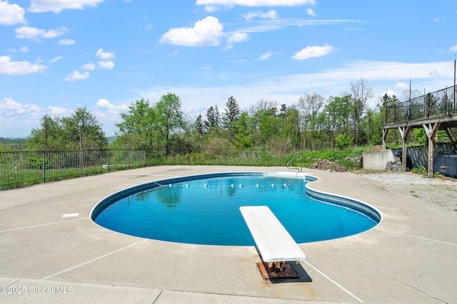 220 Anderson Cir, Fort Plain, NY 13339 - view of pool featuring fence, a diving board, and a patio area
