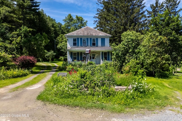 1673 County Route 64, Salem, NY 12865 - view of front of property featuring dirt driveway and covered porch