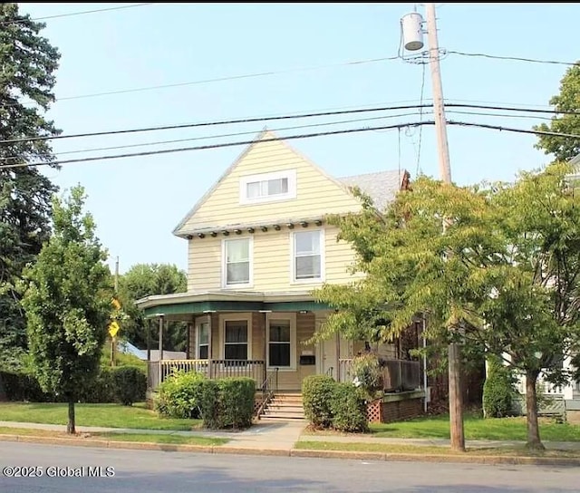 view of front of home featuring covered porch