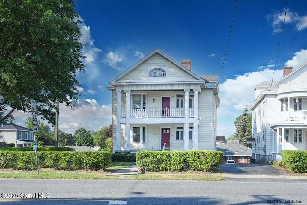 750 Western Ave, Albany, NY 12203 - neoclassical home featuring a balcony
