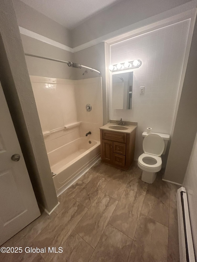 full bathroom with vanity, shower / bathtub combination, baseboard heating, and toilet