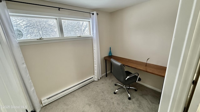 carpeted office with a baseboard radiator