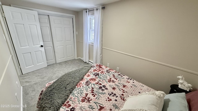 carpeted bedroom featuring a closet