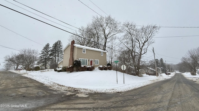 view of snow covered property