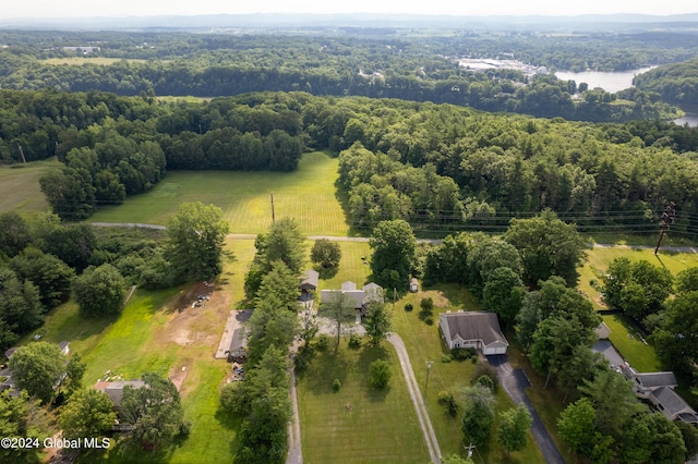 birds eye view of property with a rural view and a view of trees