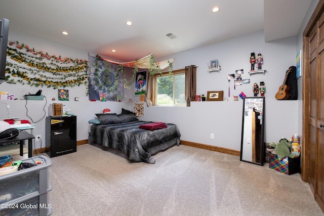 carpeted bedroom with visible vents, recessed lighting, and baseboards