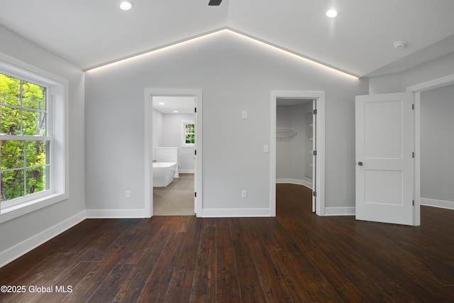 722 Swaggertown Rd, Glenville, NY 12302 - unfurnished bedroom featuring a spacious closet, multiple windows, hardwood / wood-style floors, recessed lighting, and vaulted ceiling