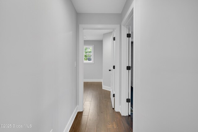 722 Swaggertown Rd, Glenville, NY 12302 - corridor featuring dark wood finished floors and baseboards