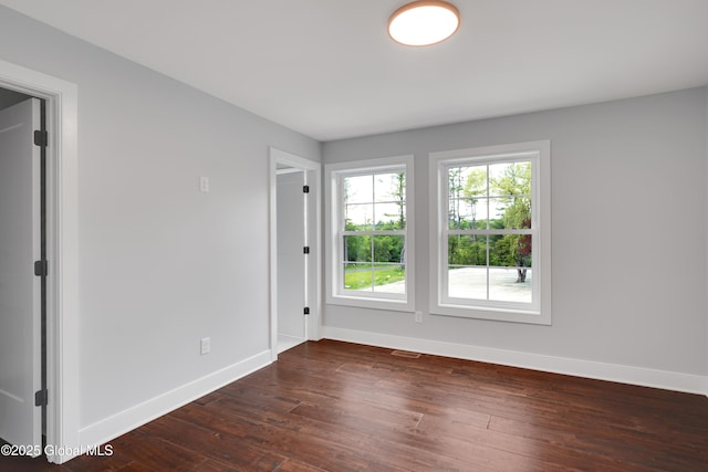 722 Swaggertown Rd, Glenville, NY 12302 - unfurnished room with baseboards and dark wood-style flooring