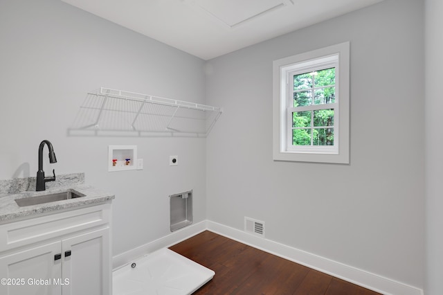 722 Swaggertown Rd, Glenville, NY 12302 - laundry room featuring washer hookup, baseboards, dark wood-style floors, hookup for an electric dryer, and cabinet space