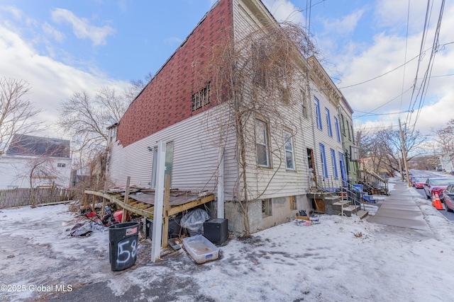 view of snow covered property