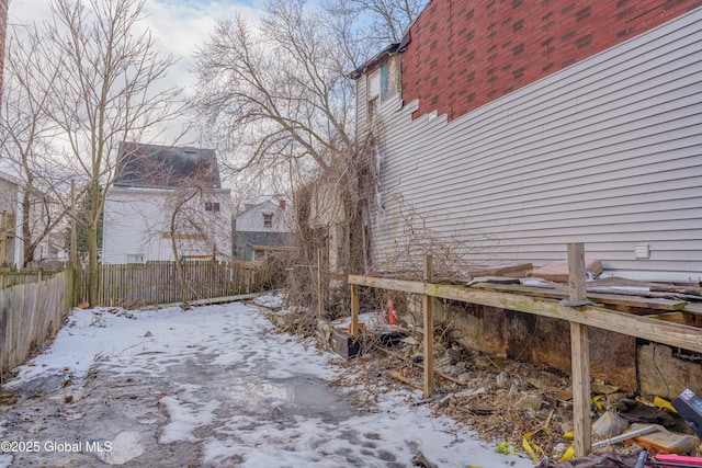 view of yard covered in snow