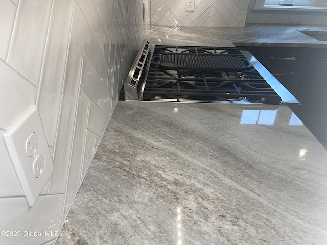interior details featuring decorative backsplash