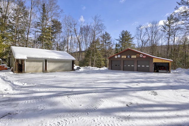 exterior space featuring an outbuilding and a garage