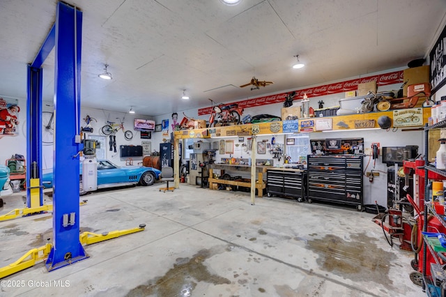 garage featuring a workshop area