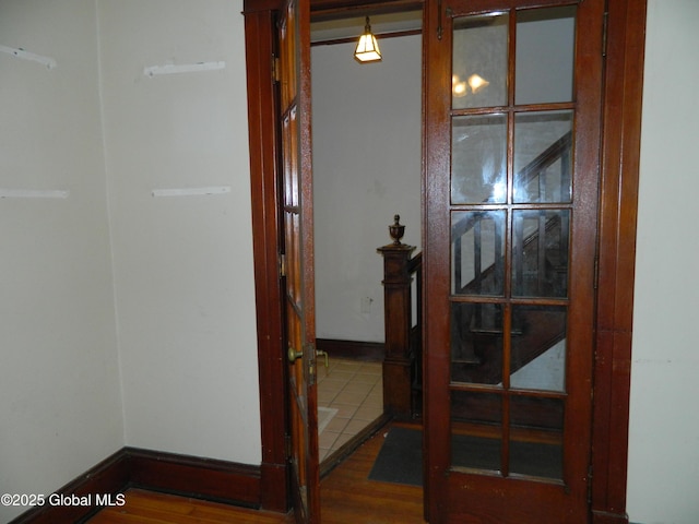 hall featuring hardwood / wood-style floors