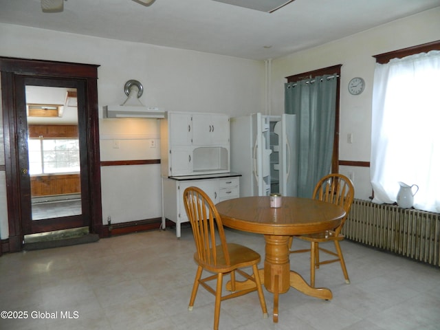 dining area with radiator