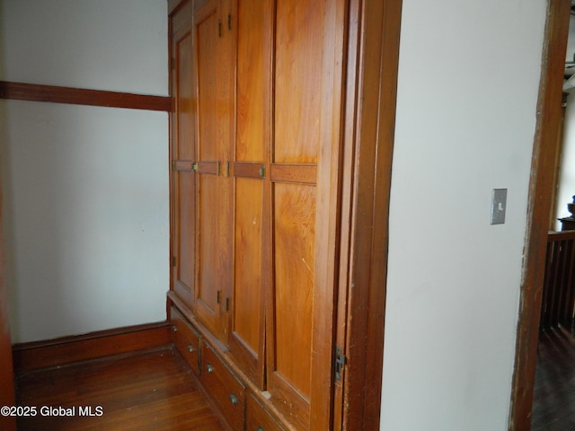 interior details featuring hardwood / wood-style flooring