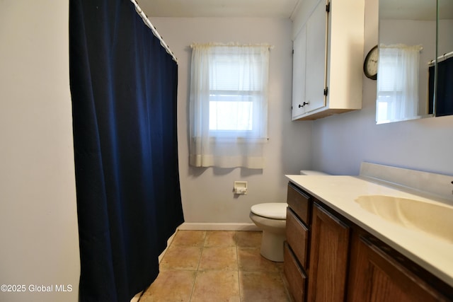 full bathroom with vanity, baseboards, curtained shower, tile patterned floors, and toilet