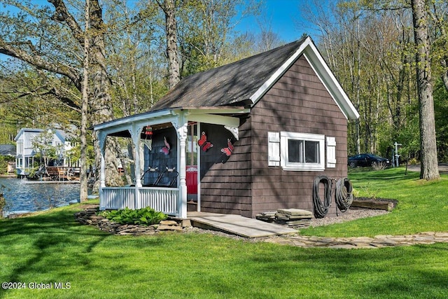 view of outdoor structure with a yard