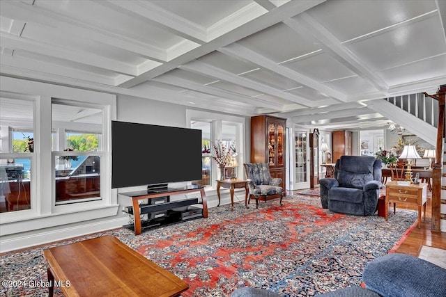 living room featuring beamed ceiling, wood-type flooring, and coffered ceiling