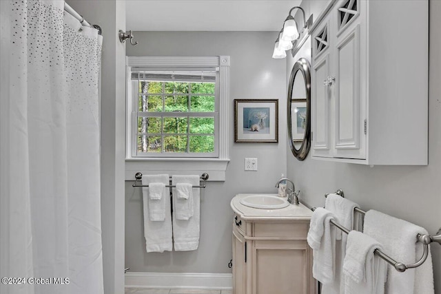 bathroom with vanity and a shower with curtain