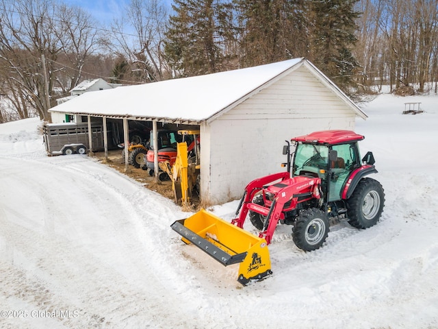 view of snow covered garage