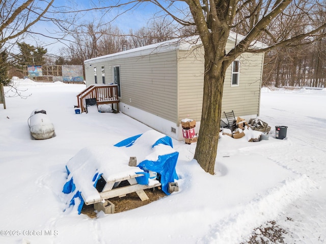 view of yard covered in snow