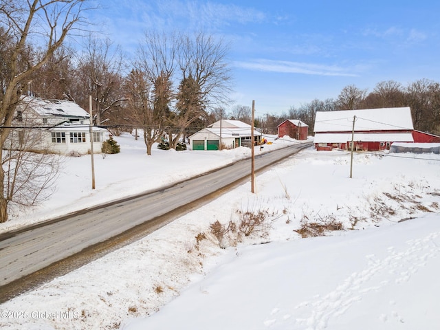 view of yard layered in snow