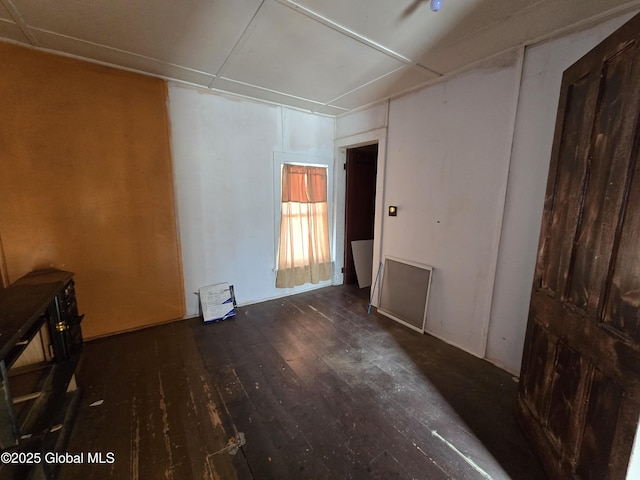 empty room featuring dark hardwood / wood-style floors