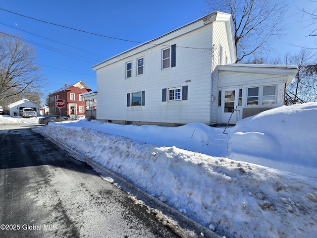 view of snow covered property