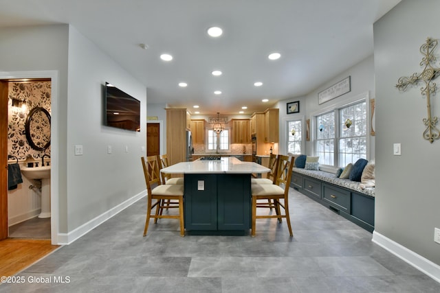 dining area with recessed lighting and baseboards