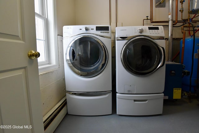 washroom featuring washing machine and dryer