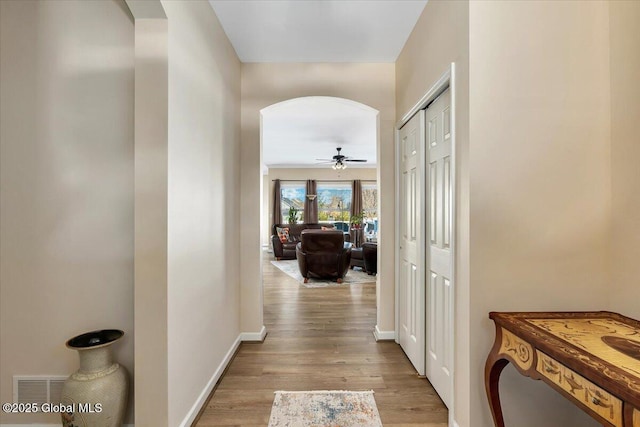 corridor featuring light hardwood / wood-style flooring