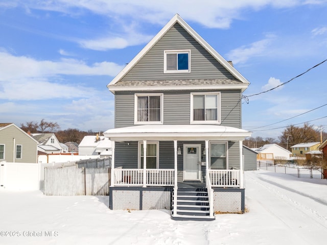 front of property featuring covered porch