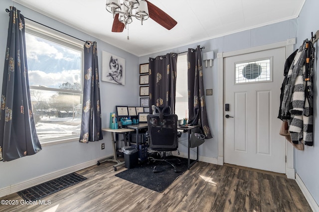 home office with ornamental molding, dark hardwood / wood-style floors, and ceiling fan