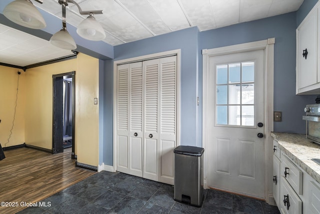 interior space featuring dark hardwood / wood-style flooring