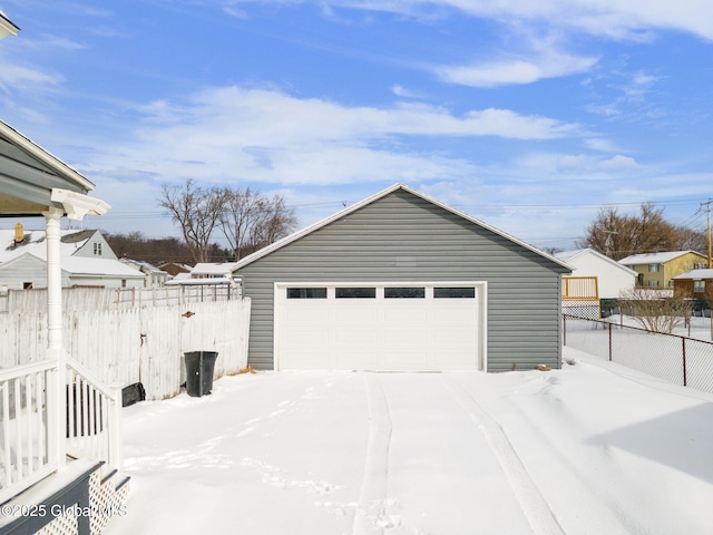 view of snow covered garage