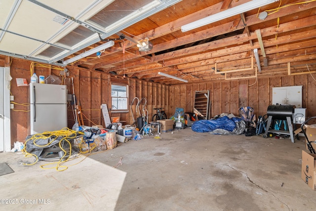 garage with white refrigerator