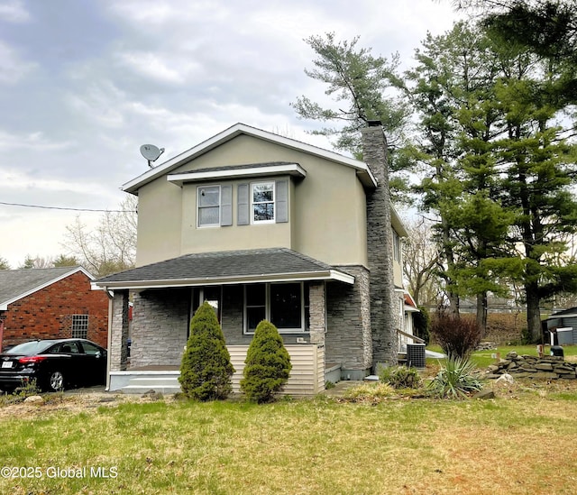 traditional home with stone siding, a chimney, and stucco siding