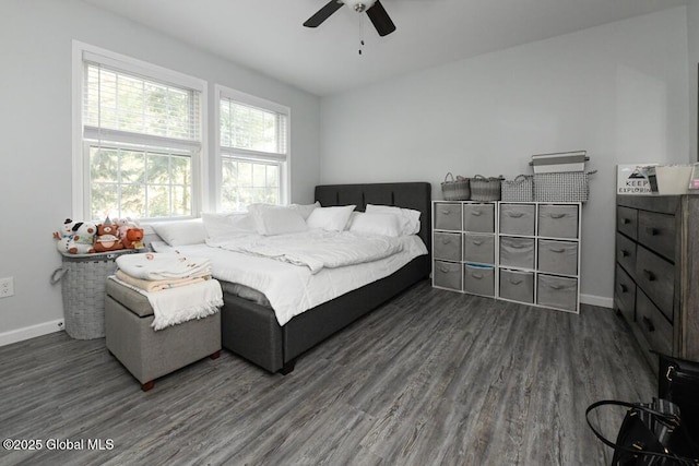 bedroom featuring dark wood-type flooring and ceiling fan