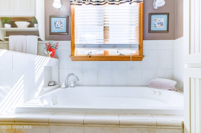 bathroom featuring tiled bath