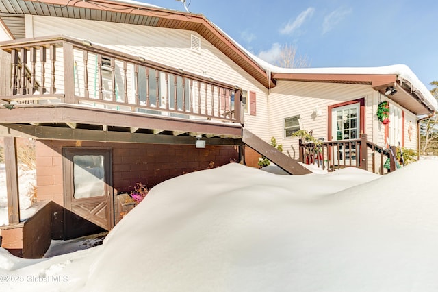 view of snow covered property