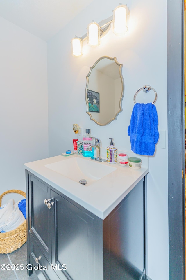 bathroom featuring vanity and tile patterned flooring