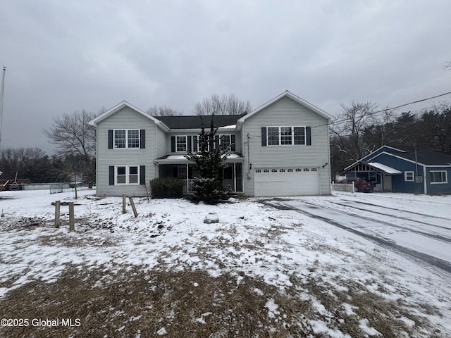 view of front of property featuring a garage