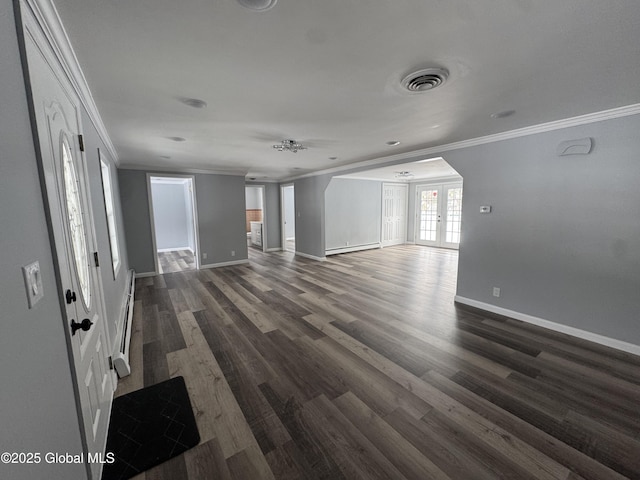 unfurnished living room featuring french doors, dark hardwood / wood-style floors, crown molding, and a baseboard heating unit