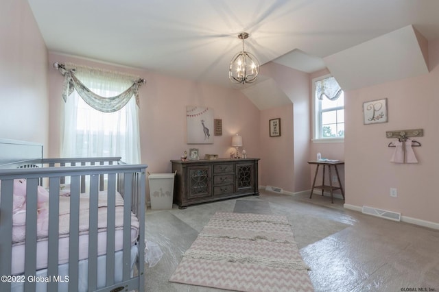 bedroom with a chandelier