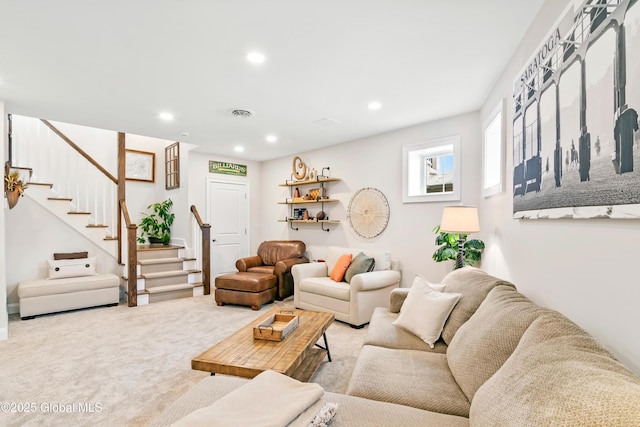 living area featuring carpet, stairs, visible vents, and recessed lighting