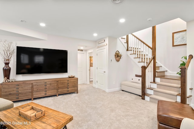 living area with carpet floors, recessed lighting, baseboards, and stairs